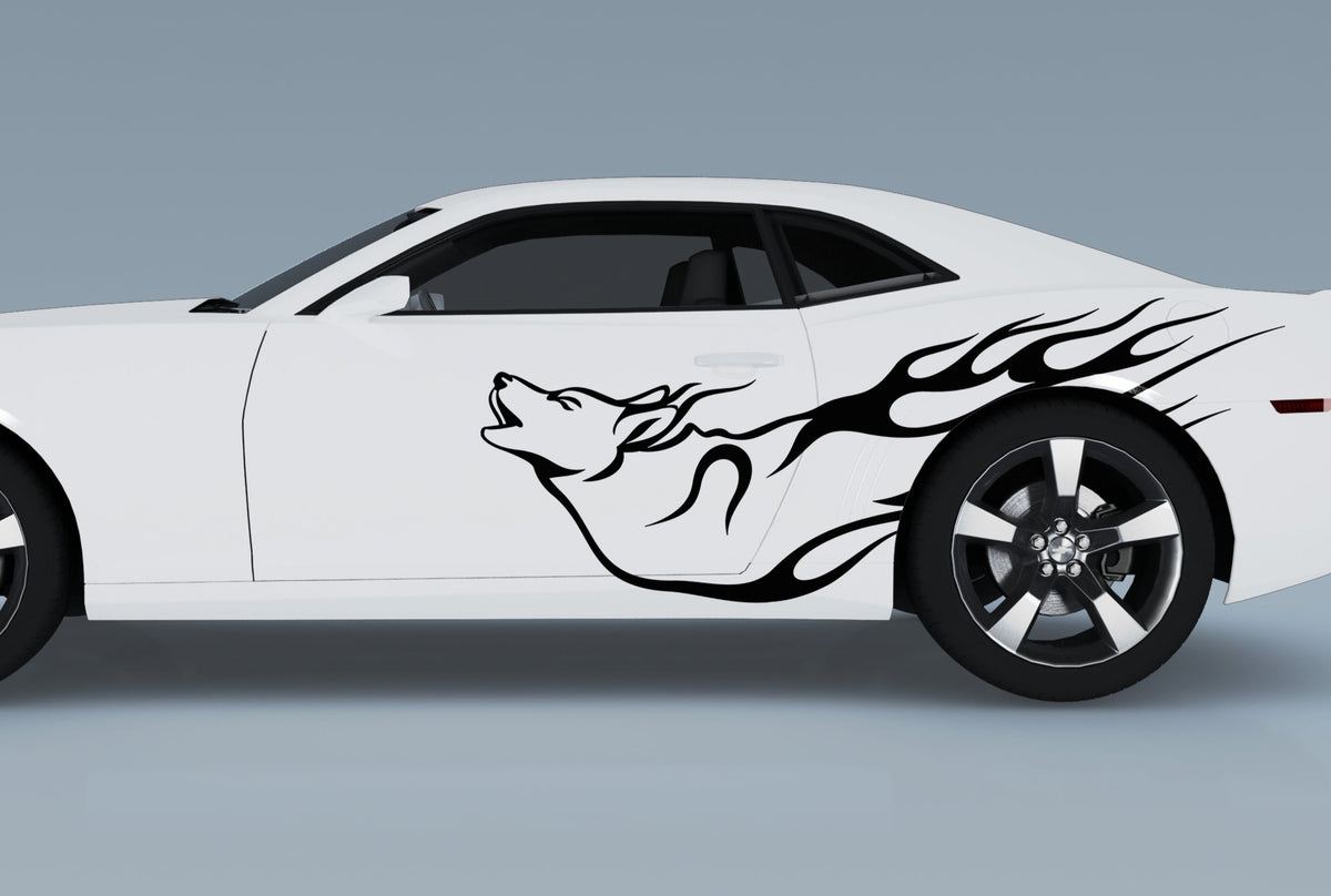 howling wolf vinyl cut graphics on the side of white camaro sports car